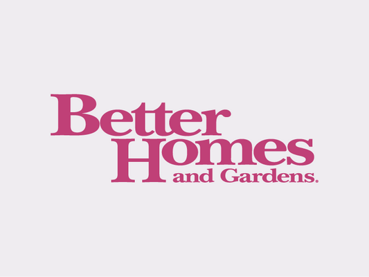 Better Homes and Gardens logo on grey background